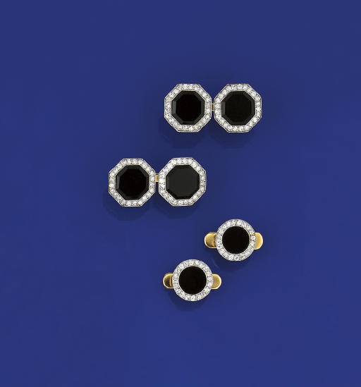 A pair of diamond and onyx cufflinks and two studs