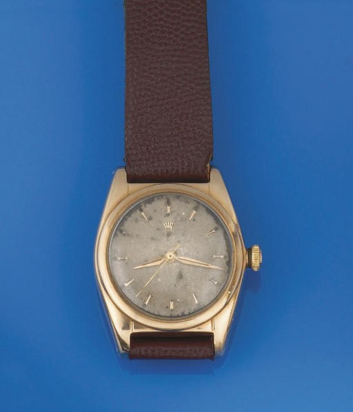 AN AUTOMATIC OYSTER PERPETUAL "BUBBLE BACK" WRISTWATCH, BY ROLEX