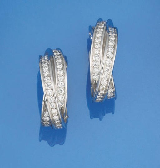 A PAIR OF 18CT. GOLD AND DIAMOND EARCLIPS, BY CARTIER