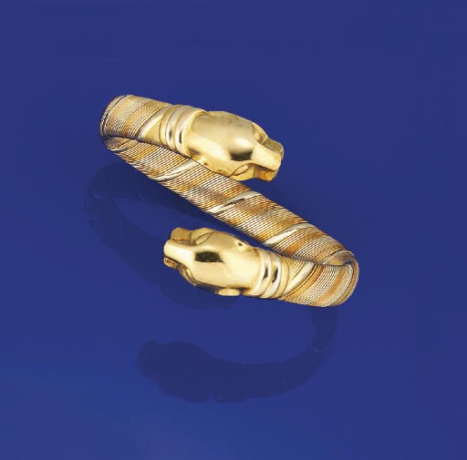 A THREE COLOUR "PANTHER" BANGLE, BY CARTIER