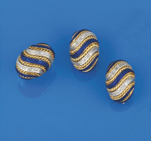 A DIAMOND AND ENAMEL RING AND EARCLIPS