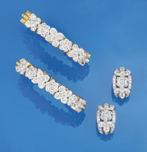 TWO DIAMOND BANGLES AND A PAIR OF EARCLIPS