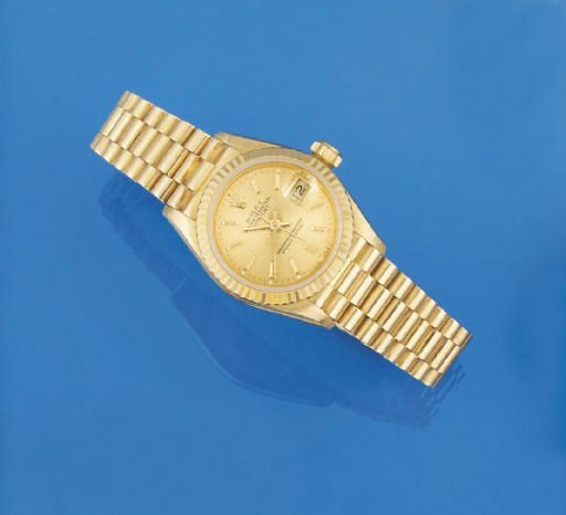 A LADY'S 18CT. GOLD AUTOMATIC WRISTWATCH, BY ROLEX