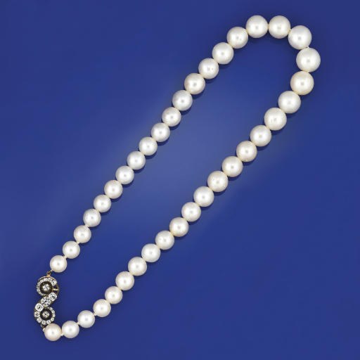 A cultured pearl neclkace to an antique diamond clasp