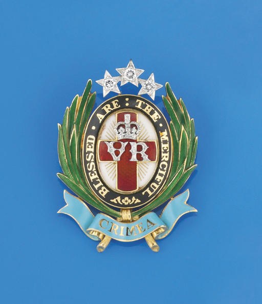 An 18ct, gold, diamond and enamel replica of the "Florence Nightingale Jewel", By Collingwood