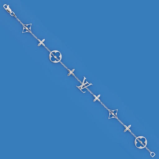 A DIAMOND SET "MONOGRAM" BRACELET AND A PAIR OF EARSTUDS, BY LOUIS VUITTON