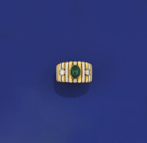 An emerald and diamond ring