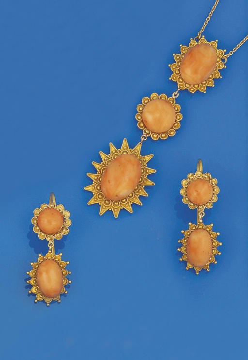 A coral necklace and matching ear pendants
