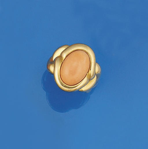 A coral ring, mounted by Van Cleef & Arpels