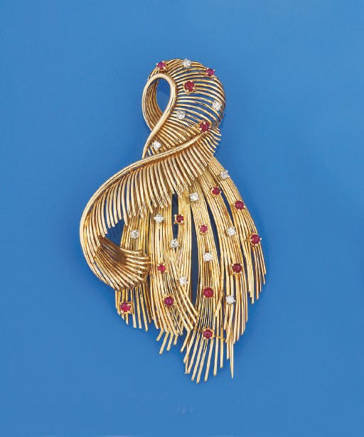 A diamond and ruby clip brooch