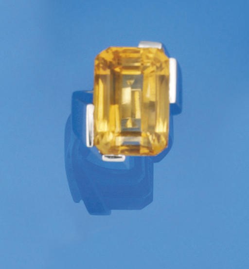 A citrine and sapphire ring