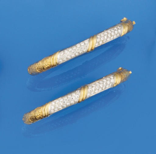 A pair of diamond set bangles