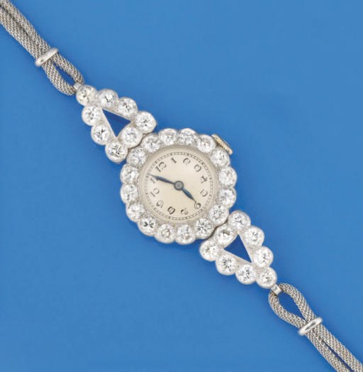 A lady's diamond set cocktail watch