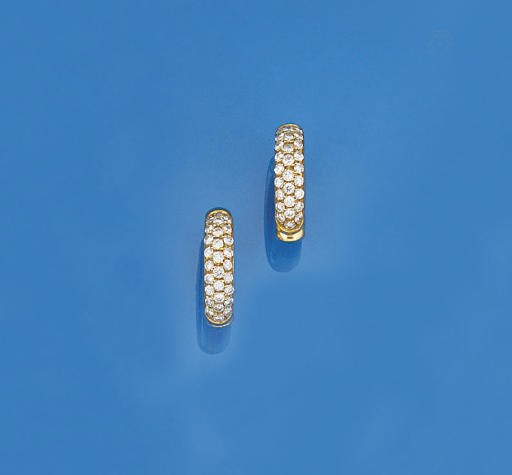 A pair of diamond set earrings