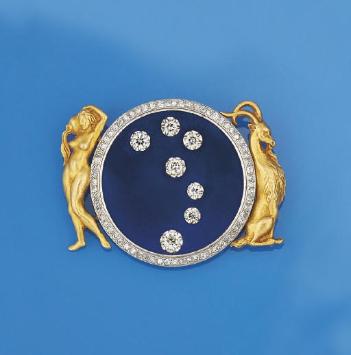 A diamond set astrological brooch