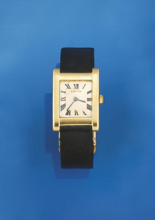 A GOLD "TANK" WRISTWATCH, BY CARTIER