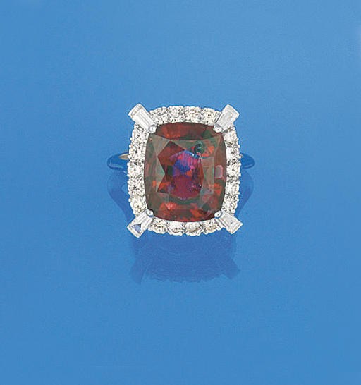 A GARNET AND DIAMOND RING
