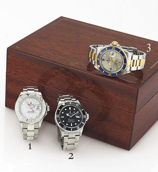ROLEX. A FINE STAINLESS STEEL WRISTWATCH WITH CENTER SECONDS, DATE AND BRACELET