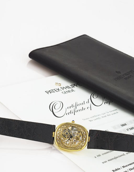 PATEK PHILIPPE. A RARE 18K GOLD OVAL SKELETONIZED WRISTWATCH