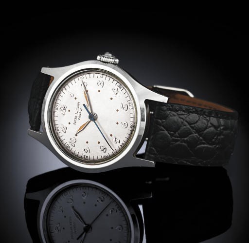 PATEK PHILIPPE.  A FINE AND VERY RARE STAINLESS STEEL WATER-RESISTANT WRISTWATCH WITH CENTER SECONDS AND LUMINESCENT BREGUET NUMERALS