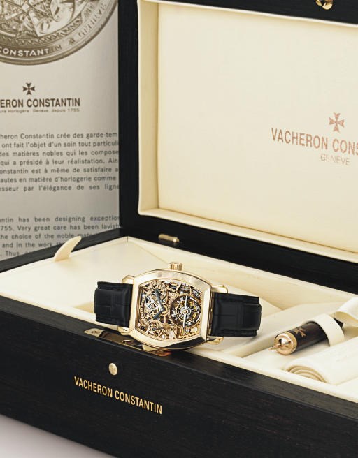 VACHERON CONSTANTIN. A FINE AND RARE 18K PINK GOLD TONNEAU SKELETONIZED TOURBILLON WRISTWATCH WITH DATE AND POWER RESERVE