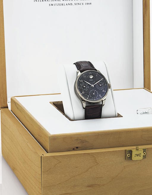IWC. A FINE AND RARE OVERSIZED 18K WHITE GOLD AUTOMATIC PERPETUAL CALENDAR WRISTWATCH WITH 7-DAY POWER RESERVE AND MOON PHASES