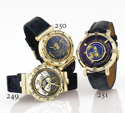 ULYSSE NARDIN. A FINE LIMITED EDITION 18K GOLD AUTOMATIC PERPETUAL CALENDAR ASTRONOMICAL WRISTWATCH