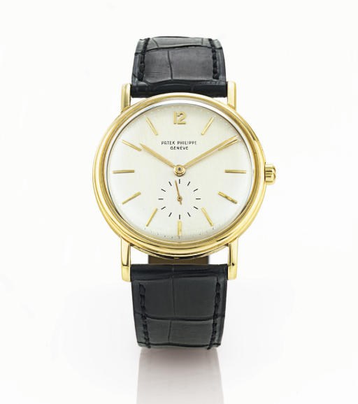 PATEK PHILIPPE. A RARE 18K GOLD AUTOMATIC WRISTWATCH