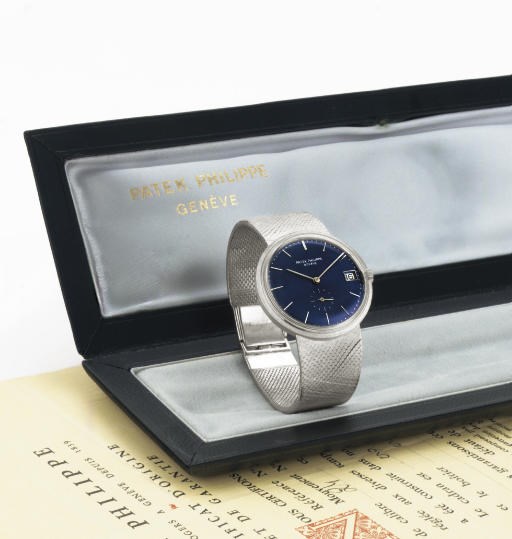 PATEK PHILIPPE. A RARE 18K WHITE GOLD AUTOMATIC BRACELET WATCH WITH DATE, ORIGINAL BOX AND CERTIFICATE