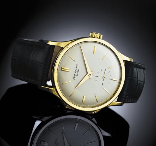 PATEK PHILIPPE. A FINE AND RARE LARGE 18K GOLD DUAL TIME WRISTWATCH