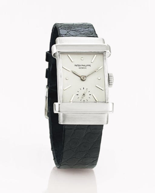 PATEK PHILIPPE.  A FINE AND RARE PLATINUM RECTANGULAR WRISTWATCH WITH HOODED LUGS