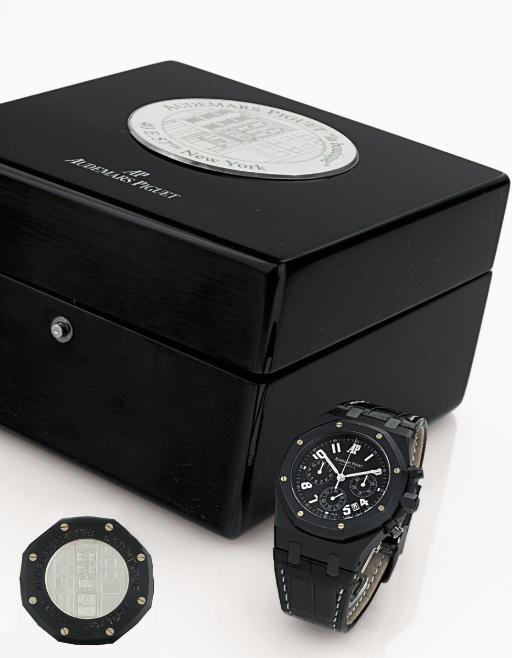 AUDEMARS PIGUET. A FINE AND RARE LIMITED EDITION BLACK PVD-COATED STAINLESS STEEL TONNEAU AUTOMATIC CHRONOGRAPH WRISTWATCH WITH DATE