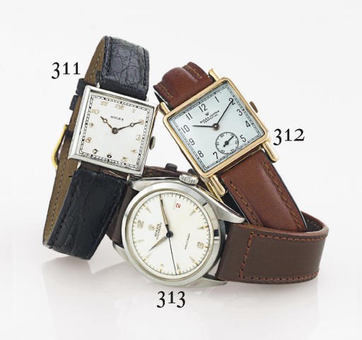 ROLEX.  A STAINLESS STEEL WRISTWATCH WITH CENTER SECONDS AND DATE