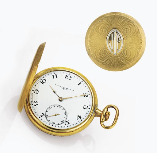 PATEK PHILIPPE.  A RARE 18K GOLD HUNTER CASE KEYLESS LEVER DRESS WATCH
