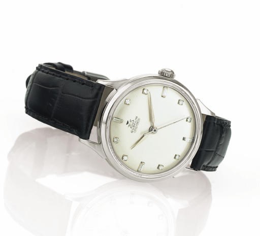 GÜBELIN.  AN 18K WHITE GOLD AND DIAMOND AUTOMATIC WRISTWATCH WITH CENTER SECONDS