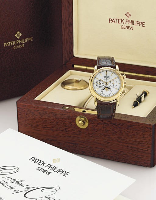 PATEK PHILIPPE.  A FINE 18K GOLD PERPETUAL CALENDAR CHRONOGRAPH WRISTWATCH WITH MOON PHASES