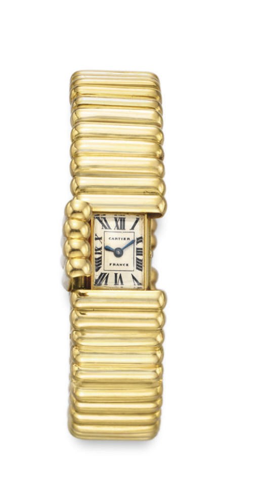 A GOLD WATCH-BRACELET, BY CARTIER