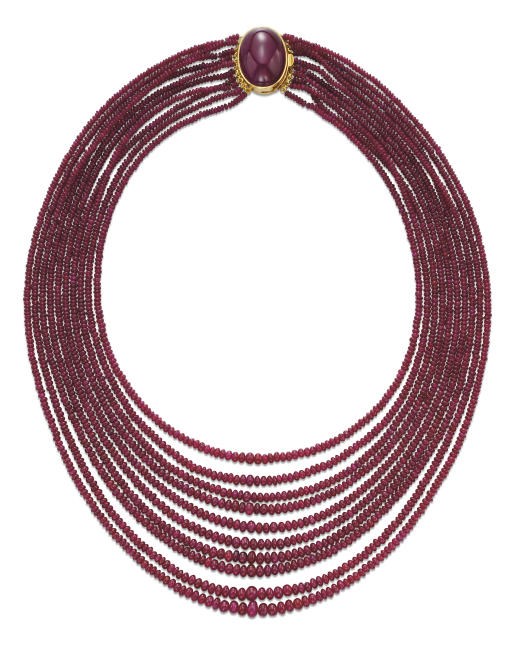A MULTI-STRAND RUBY BEAD NECKLACE