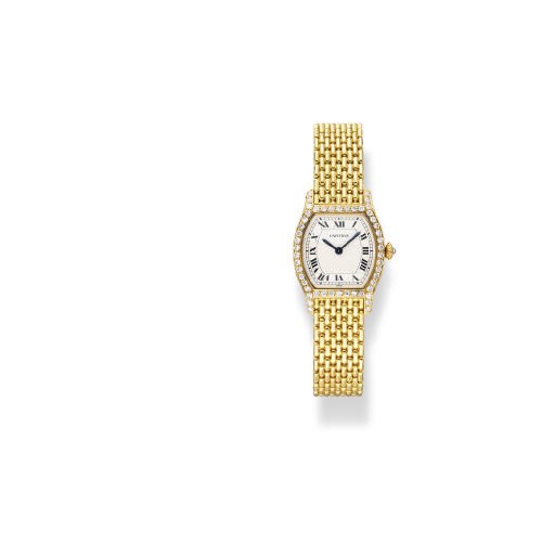 A DIAMOND AND GOLD 'TONNEAU' WRISTWATCH, BY CARTIER