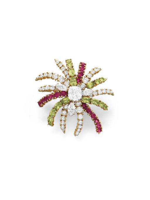 A DIAMOND, RUBY AND PERIDOT 'STARBURST' BROOCH