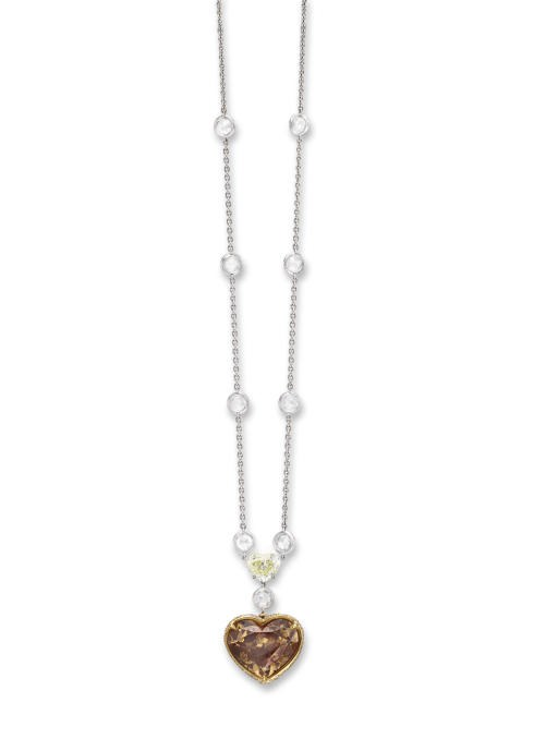 A COLORED DIAMOND PENDANT NECKLACE