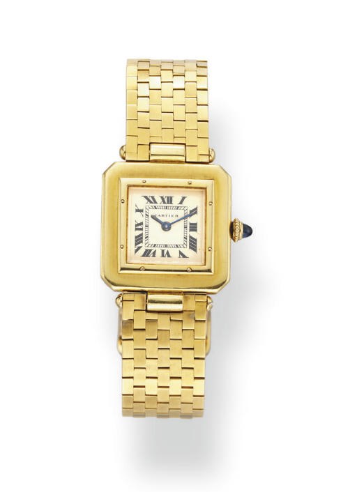 A GOLD "TANK" WRISTWATCH, BY CARTIER