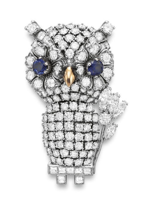 A DIAMOND AND SAPPHIRE OWL BROOCH, BY NARDI