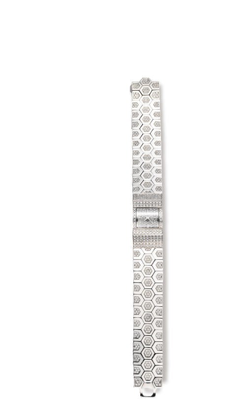 A DIAMOND AND WHITE GOLD 'LUDO SWANN' WRISTWATCH, BY VAN CLEEF AND ARPELS