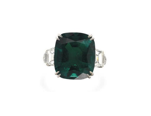 A FINE EMERALD AND DIAMOND RING