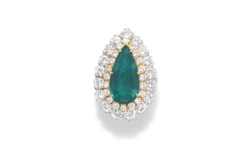 AN EMERALD AND DIAMOND RING, BY DAVID WEBB