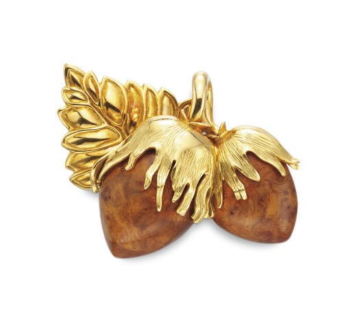 A WOOD AND GOLD BROOCH, BY RENE BOIVIN