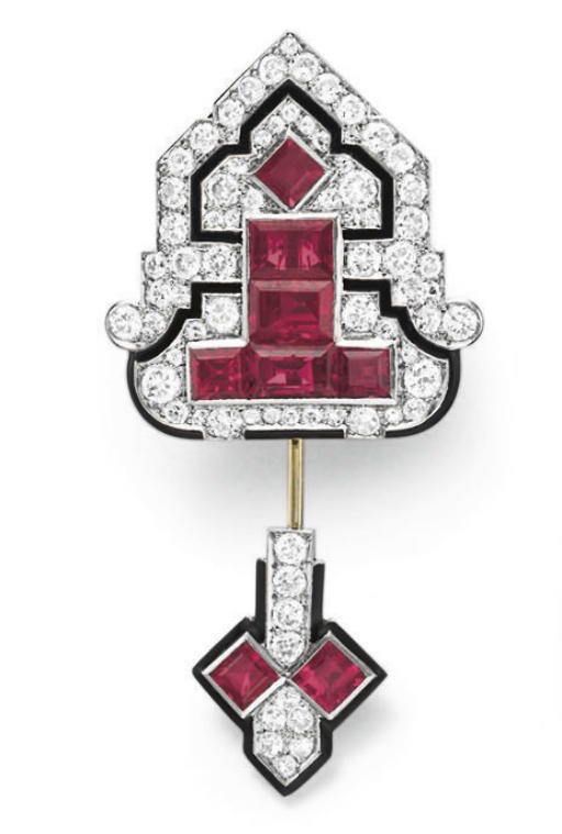 AN ART DECO DIAMOND, RUBY AND ENAMEL JABOT PIN, BY CARTIER
