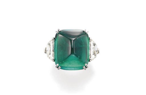 AN EMERALD AND DIAMOND RING