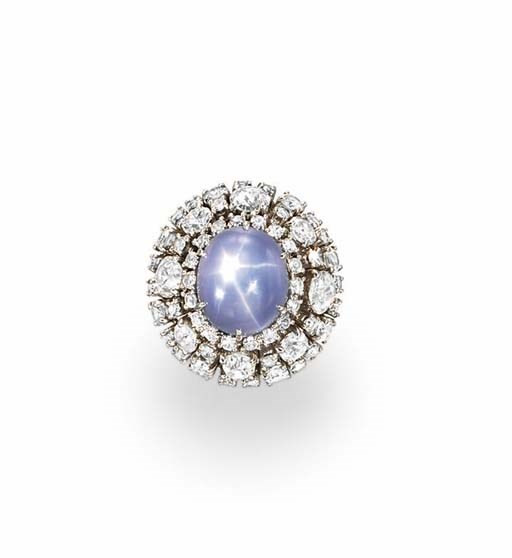 A STAR SAPPHIRE AND DIAMOND RING